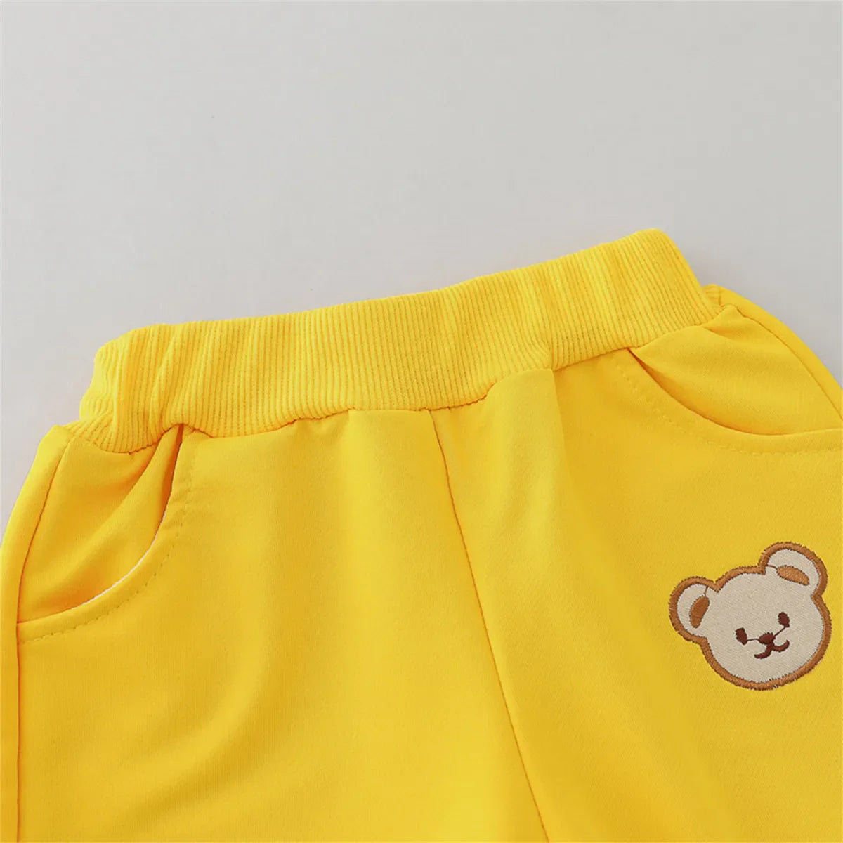 Kids clothing bear print cotton set, matching long sleeve shirt and pants.