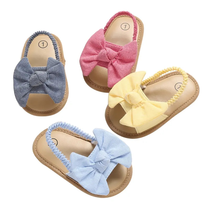 Cute blue baby boy sandals with soft cork sole, ideal for newborns and first walking; comfort footwear.