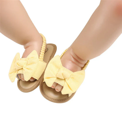 Bright yellow baby comfort shoes with soft cork sole, suitable for both baby boys and girls.