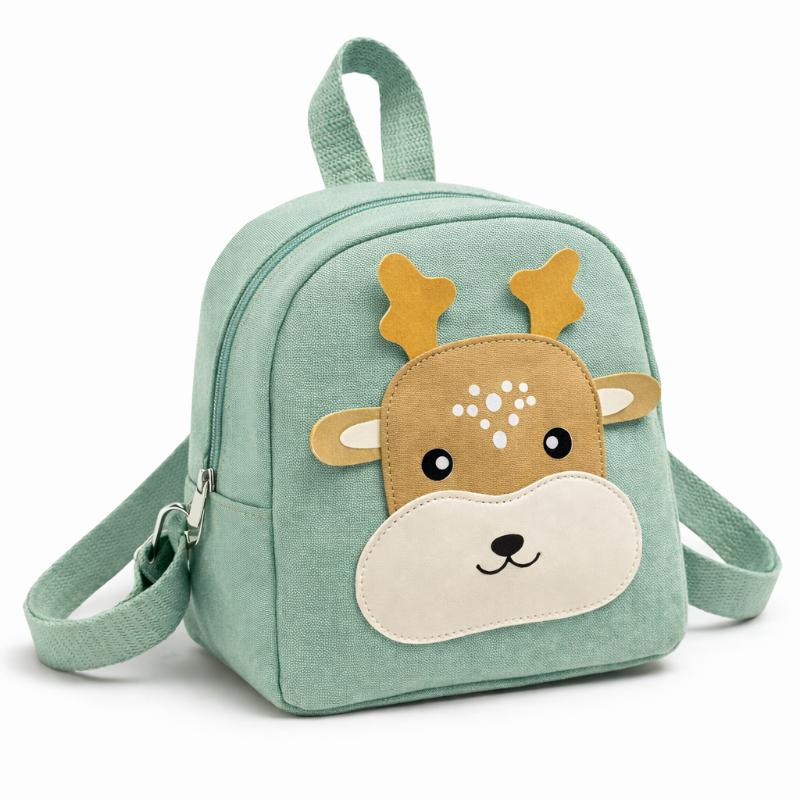 Group of playful kids wearing various animal cartoon backpacks, having fun