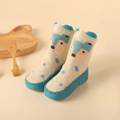 Durable anti-slip floor socks with a cartoon lion design, perfect for baby's first steps.