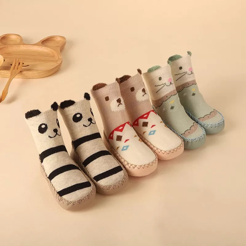 Cozy anti-slip floor socks for newborns, adorned with a delightful cartoon sheep.