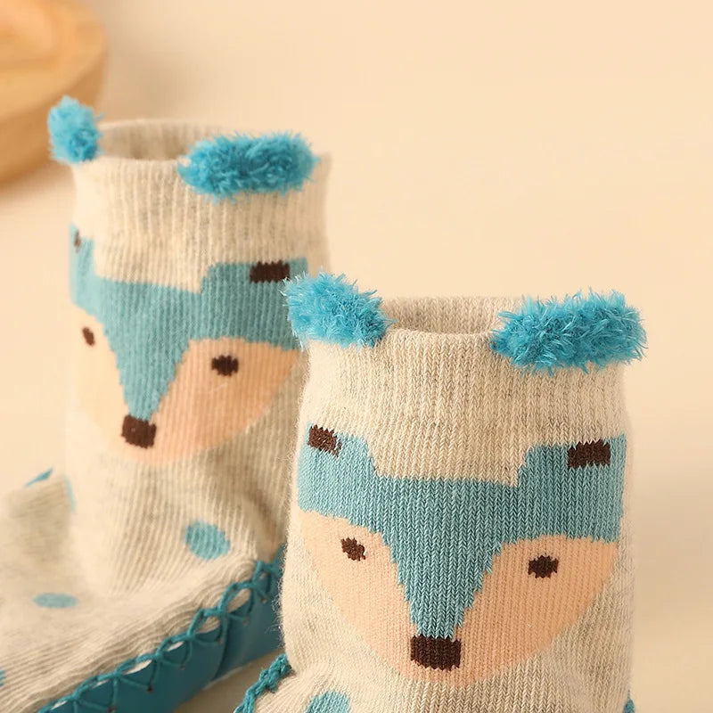 Stylish anti-slip floor socks for baby, featuring a modern cartoon animal pattern.