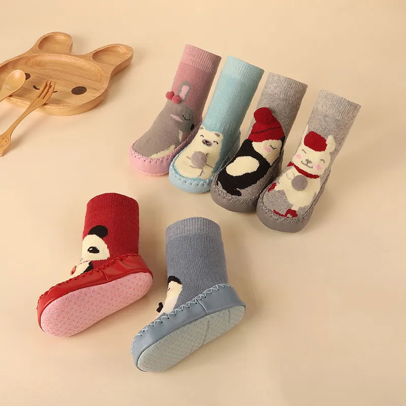 Essential anti-slip floor socks with a cartoon zebra design, great for baby's everyday wear.