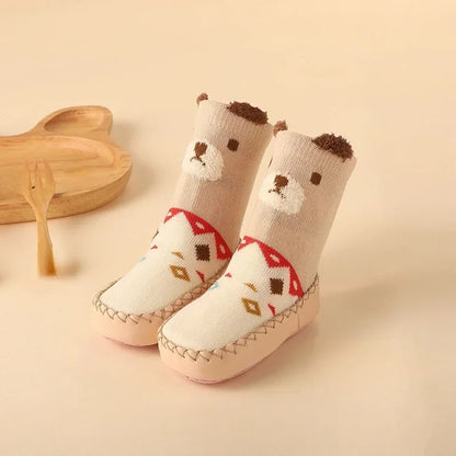 Unisex baby anti-slip floor socks with various cartoon animals for optimal grip.
