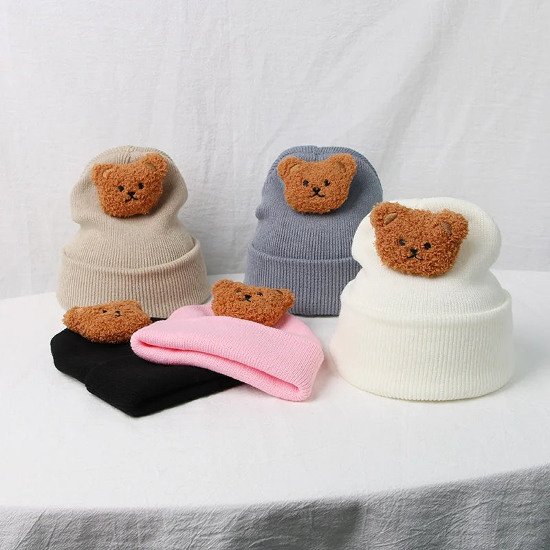 Unisex knitted bear hat, a perfect accessory to complete any infant's winter outfit.