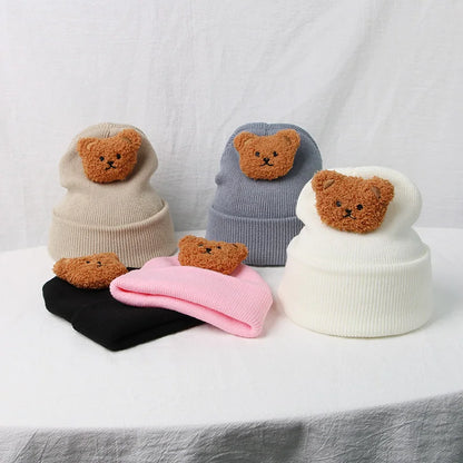 Unisex knitted bear hat, a perfect accessory to complete any infant's winter outfit.