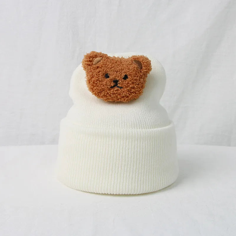 Infant fashion: a cute and warm knitted bear hat, suitable for any baby.