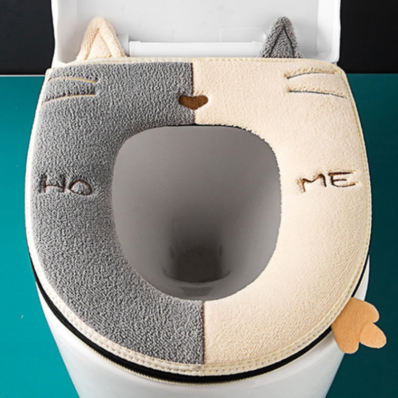 Soft cat-themed toilet seat cushion for kids, featuring a handle for comfort during potty training