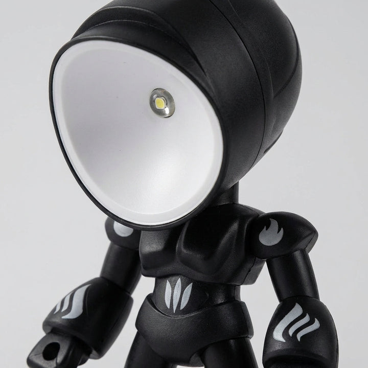 Gentle LED robot bedside lamp for children's reading & nursery decor. Ideal night light for kids' rooms.