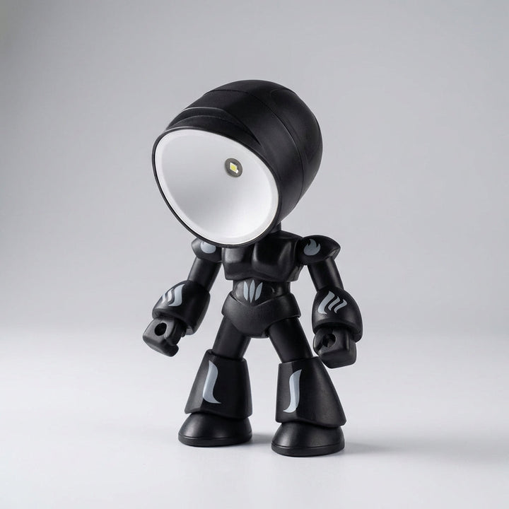 Children's Robot Bedside Lamp, a compact LED reading light, perfect for kids' bedrooms and gentle illumination.