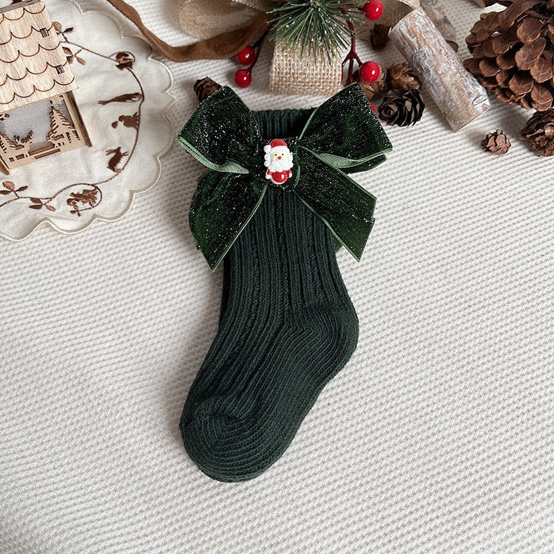 Baby's anti-slip socks featuring a Christmas tree design, soft and festive