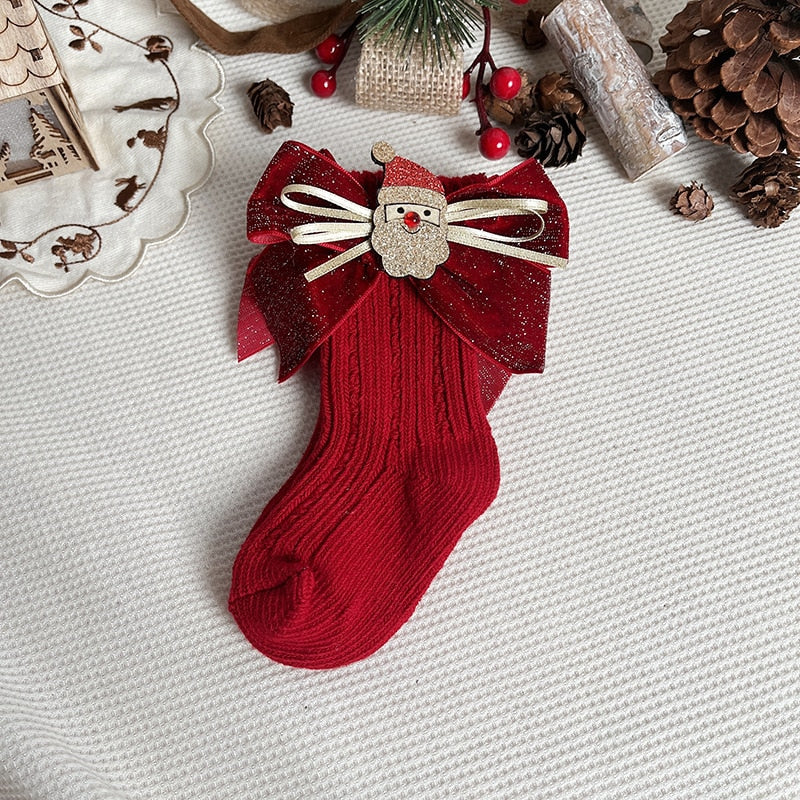 Close-up of anti-slip grip on a Christmas character baby sock, safety first