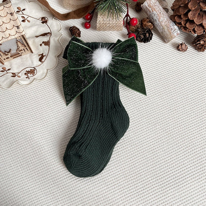 Children's apparel: a pair of cozy anti-slip Christmas socks with a bear design