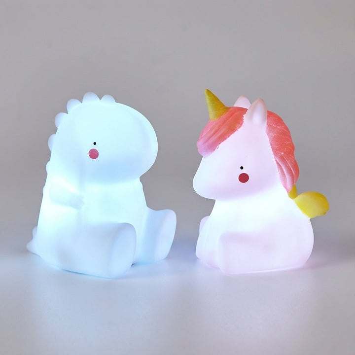 Dimmable LED Dreamasaur kids' night light. Soft glow dinosaur lamp, perfect nursery decor & sleep aid.