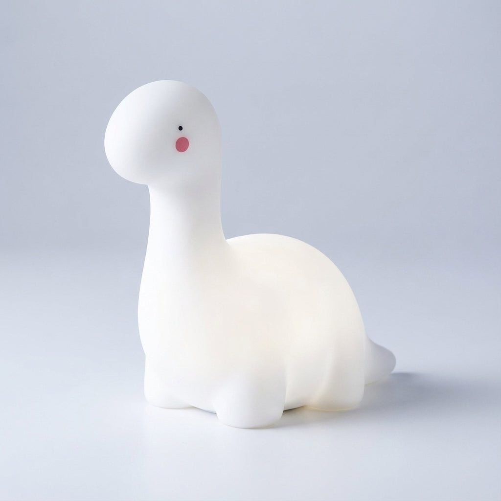 Dreamasaur LED night light, a charming dinosaur bedroom decor piece for children. Gentle glow & sleep aid.