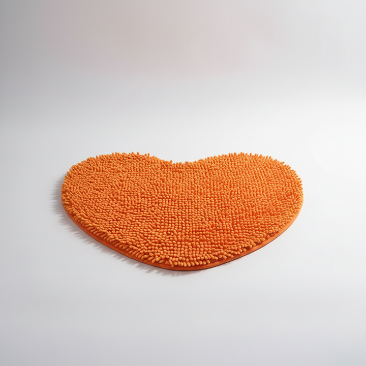 Soft microfiber chenille heart-shaped floor mat for cozy bathroom comfort & cute home decor.