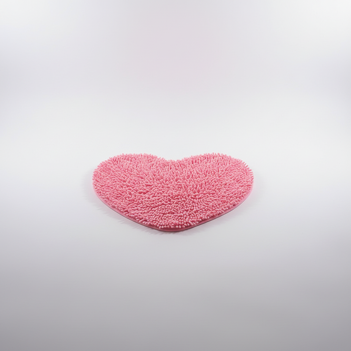 Luxurious heart-shaped microfiber bath mat, absorbent & anti-slip, adds cute decor to any bathroom.
