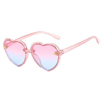 Packaged heart-shaped girls sunglasses, showing UV protection label, ready as a kids gift for toddler accessories