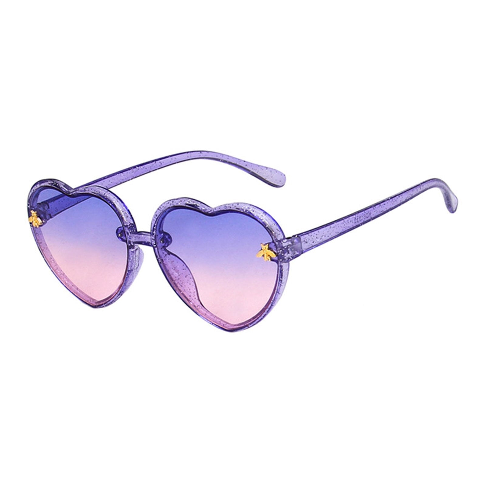 Small girl holding heart-shaped orange sunglasses, demonstrating how cute and functional kids eyewear can be