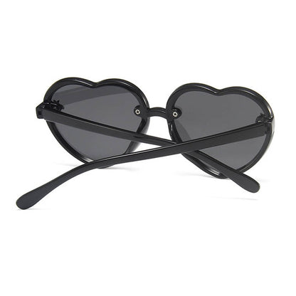 Girls' stylish red heart-shaped sunglasses with full UV protection, perfect for kids eyewear & outdoor play