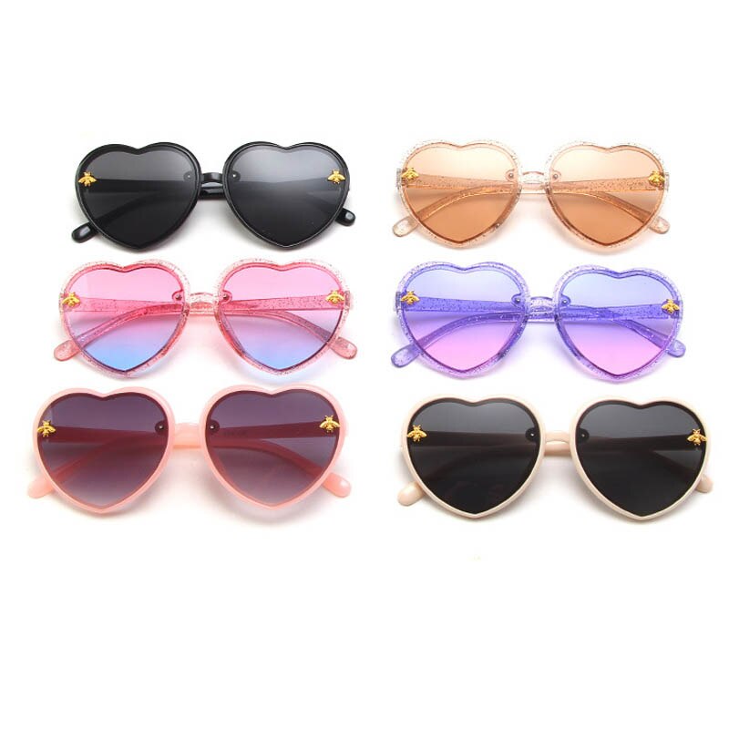 Colorful heart-shaped girls sunglasses in purple, providing essential UV protection for children's outdoor activities