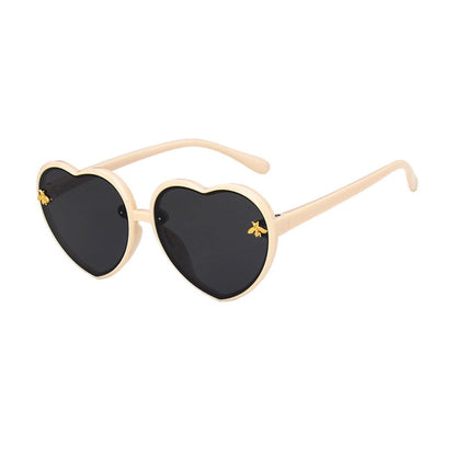 Heart-shaped girls' black sunglasses, offering classic style and crucial UV protection for children's eyes