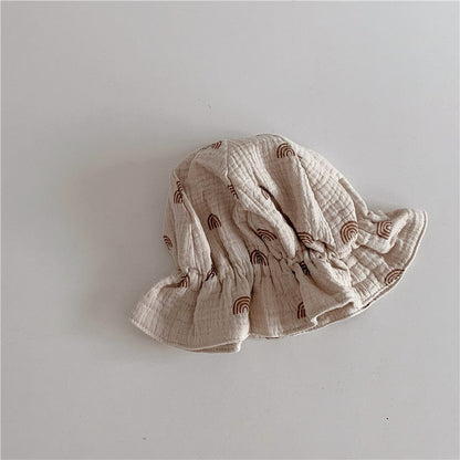 Collection of colorful baby cotton beanies, showing various shades for stylish baby accessories.