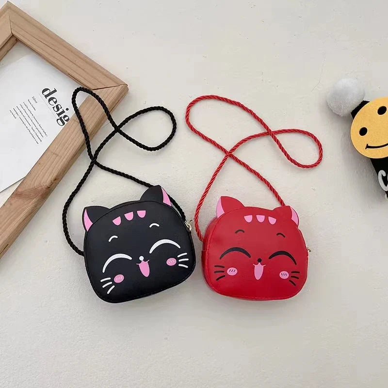 Durable PU leather cat crossbody coin purse for kids, featuring an easily adjustable strap.