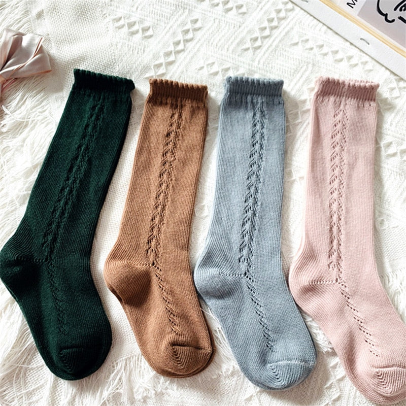 Cute kids' knee-high cotton blend socks in a vibrant blue, perfect for toddlers.