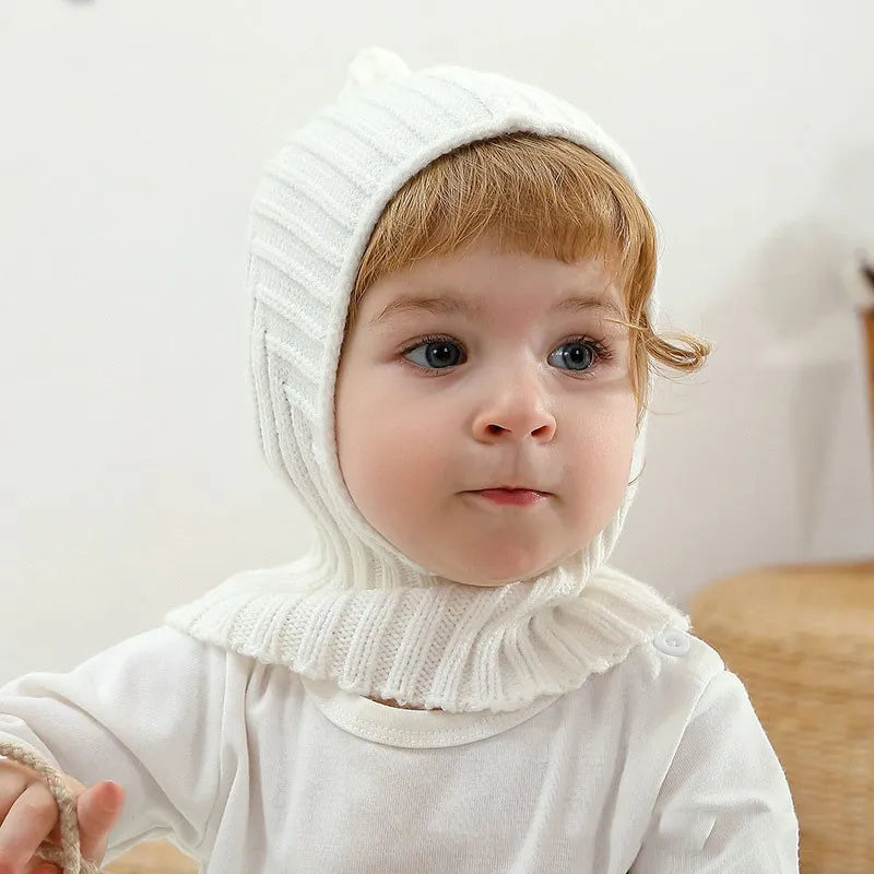 Soft acrylic baby winter hat, hand-knitted texture for warmth, ideal for cold weather, unisex newborn.