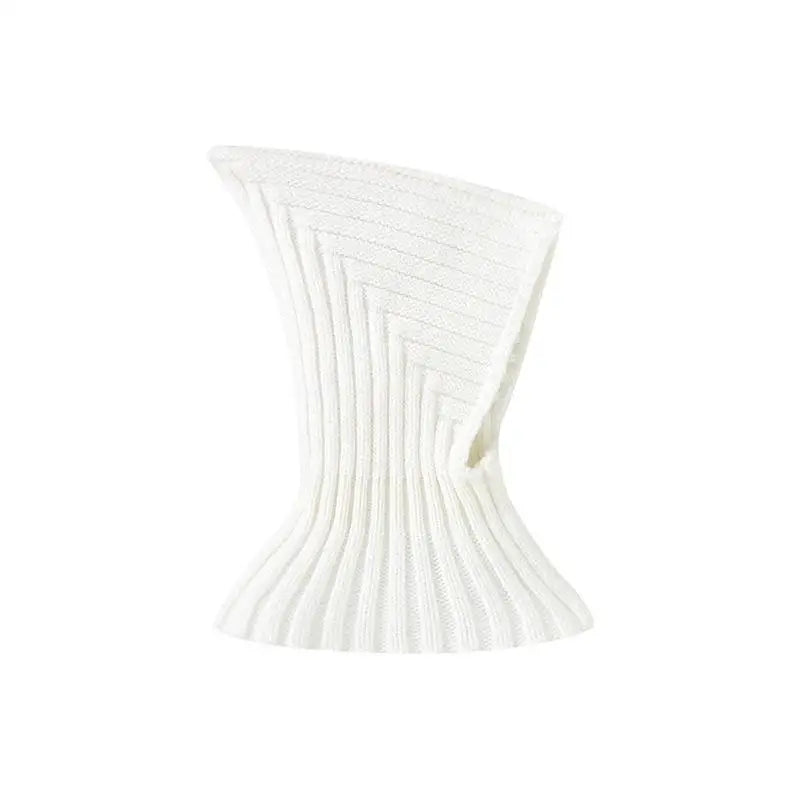 Knitted baby hat in a light color, suitable for both baby boys and girls, a warm winter accessory.