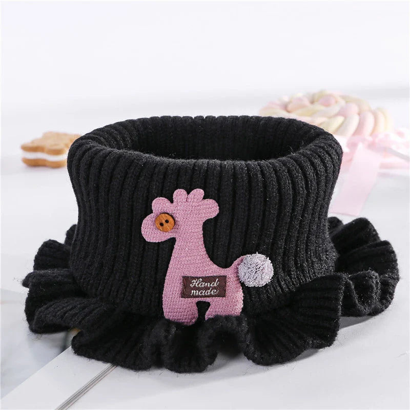 Adorable knitted giraffe neck warmer, a cute accessory for children this winter.