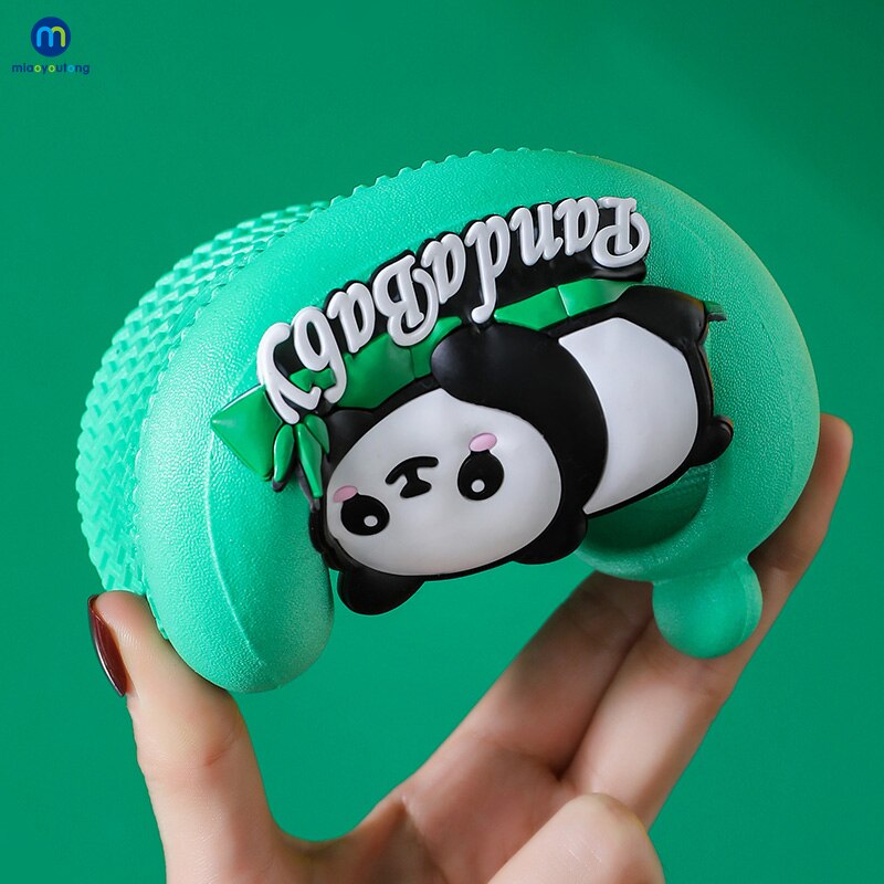 Happy child wearing cute panda non-slip sandals, enjoying comfortable indoor play