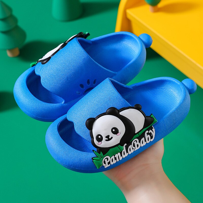 Side view of a child's foot in a comfortable panda non-slip sandal, ideal for play