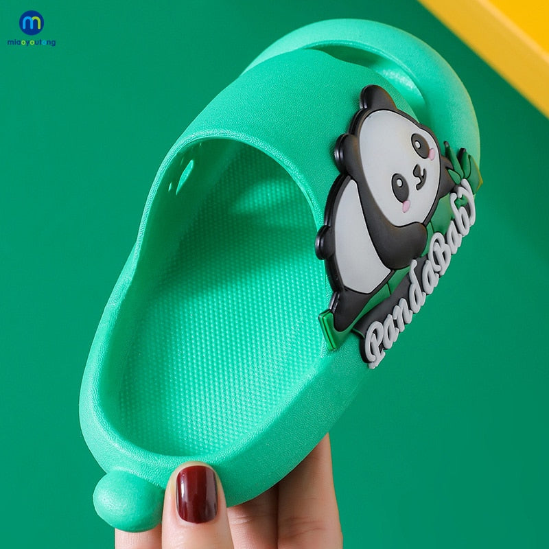 Child taking a step in their cozy panda sandals, demonstrating flexible non-slip footwear