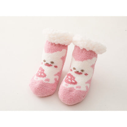 Pair of blue baby thick cotton anti-slip socks with star pattern, warm infant clothing accessory.