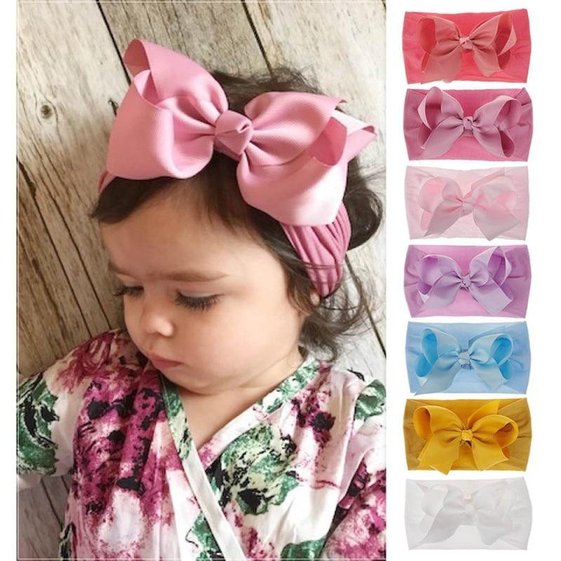 Cute pink bow headband for baby girls, soft cotton, stretchable newborn accessory