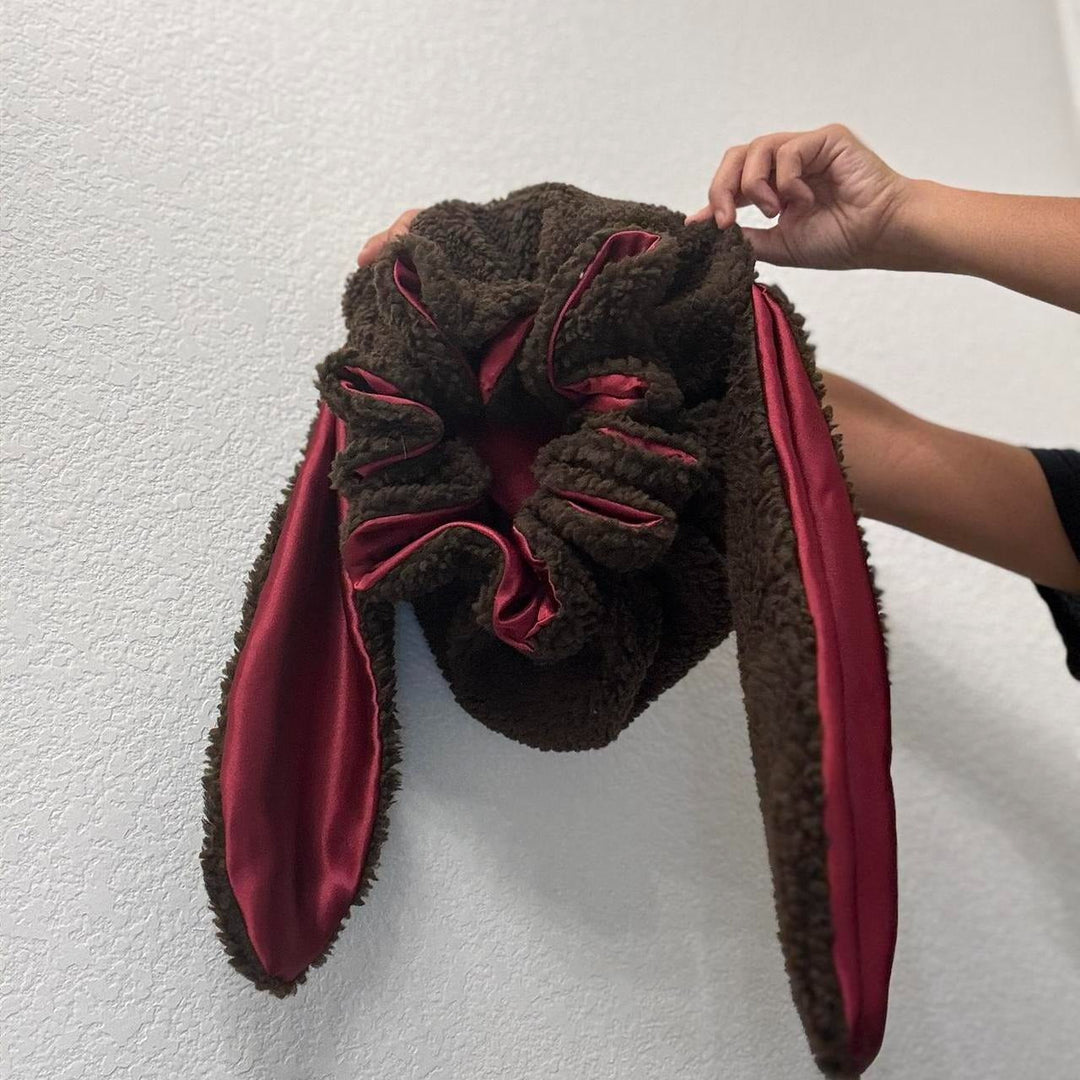 Soft women's bunny bonnet hat in pink, ideal for hair protection and warmth.