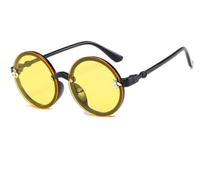 Orange kids sunglasses with flexible frame, offering essential UV protection for toddlers