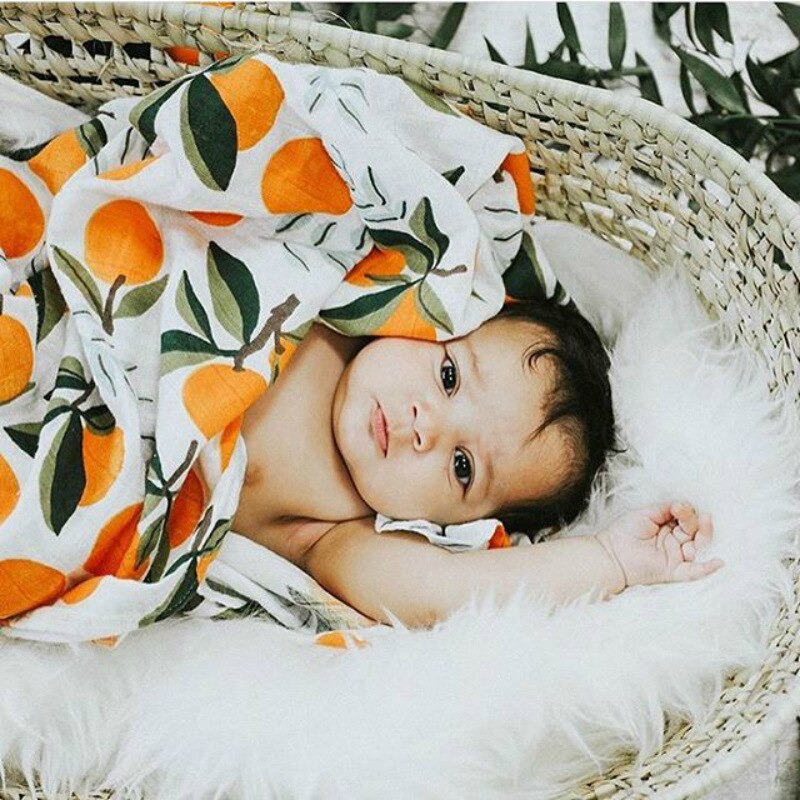 Sunny yellow newborn baby swaddle wrap & headband set. Cute, soft cotton for infant comfort & sleep.