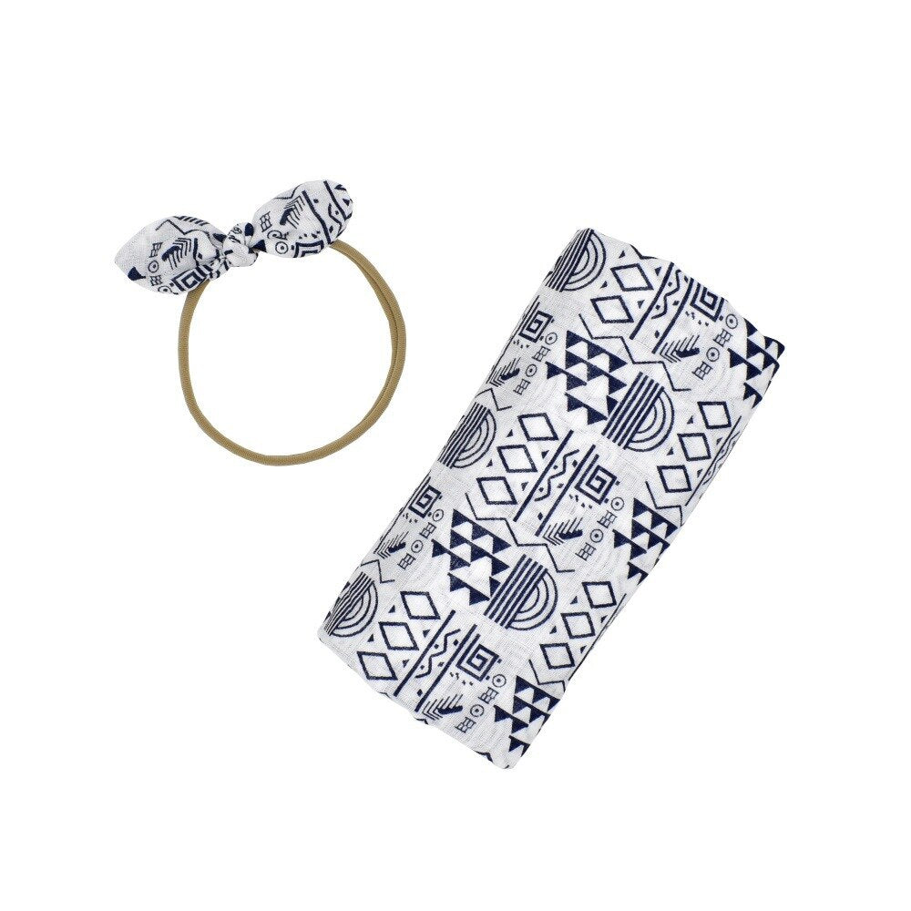 Cute patterned newborn baby swaddle wrap & headband set. Soft cotton blanket for snug infant comfort.
