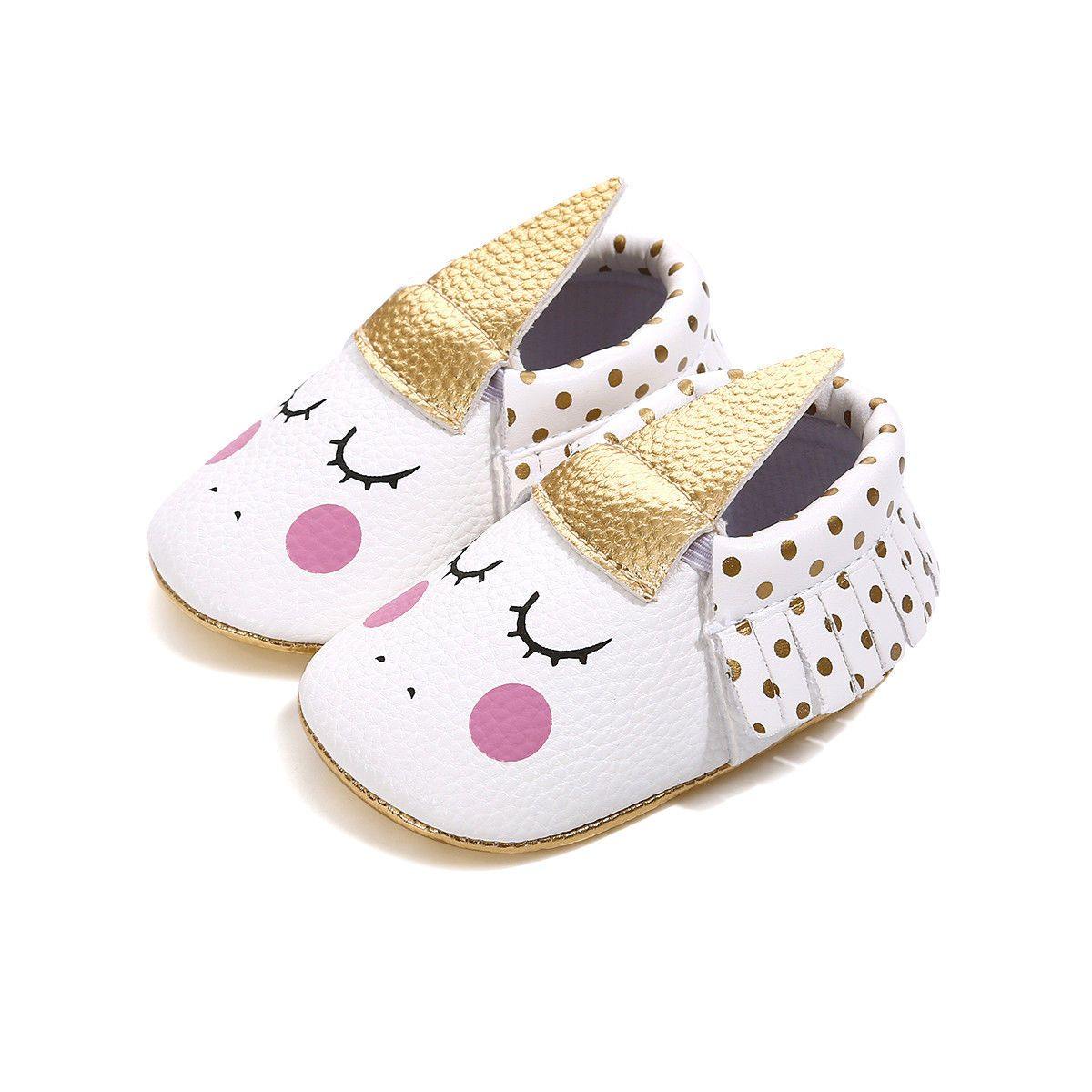 Cute pink unicorn baby girl shoes with non-slip soles, perfect for infants learning to walk.