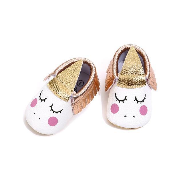 Top-down view of whimsical unicorn baby shoes for girls, featuring non-slip grip dots.