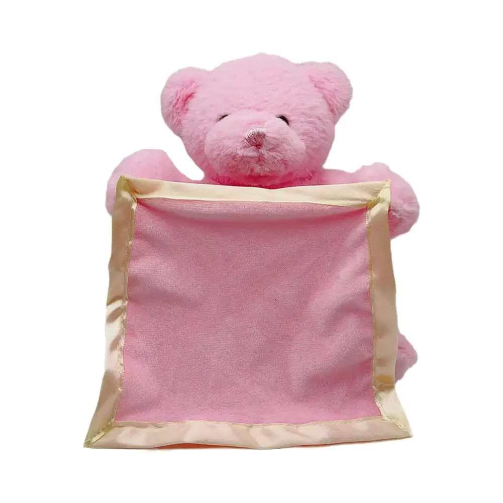 White and brown peekaboo bear, a soft interactive toy that sings and covers its eyes.