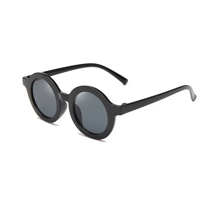 Kids round sunglasses in a vibrant red, UV protection, fun and safe baby accessory