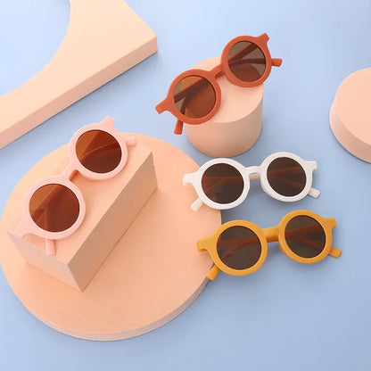 Stylish blue round kids sunglasses with UV protection, polyester frame, children's trendy eyewear