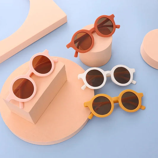 Stylish blue round kids sunglasses with UV protection, polyester frame, children's trendy eyewear
