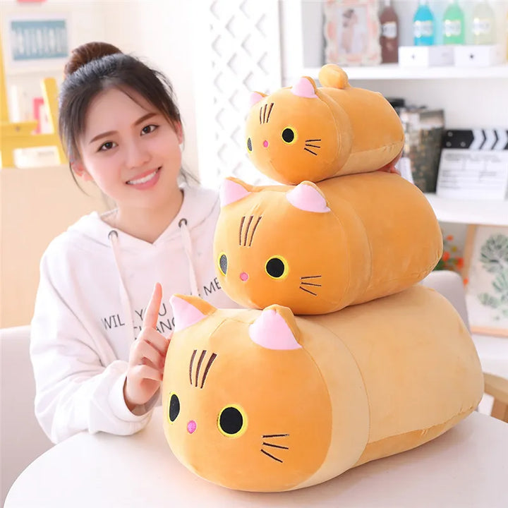 Cartoon cat soft toy, a comforting stuffed animal for baby's nursery.