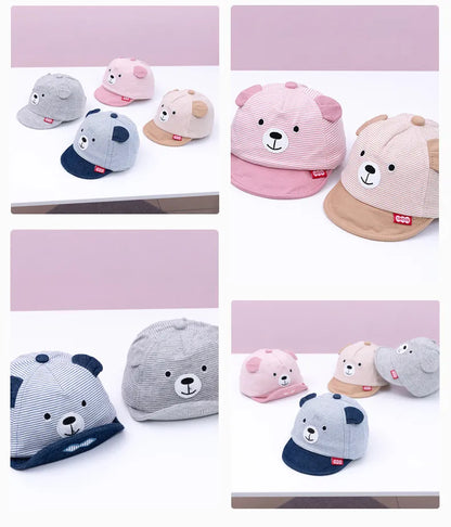 A baby's hand touching a soft cotton cartoon baby cap, adjustable for all-season use